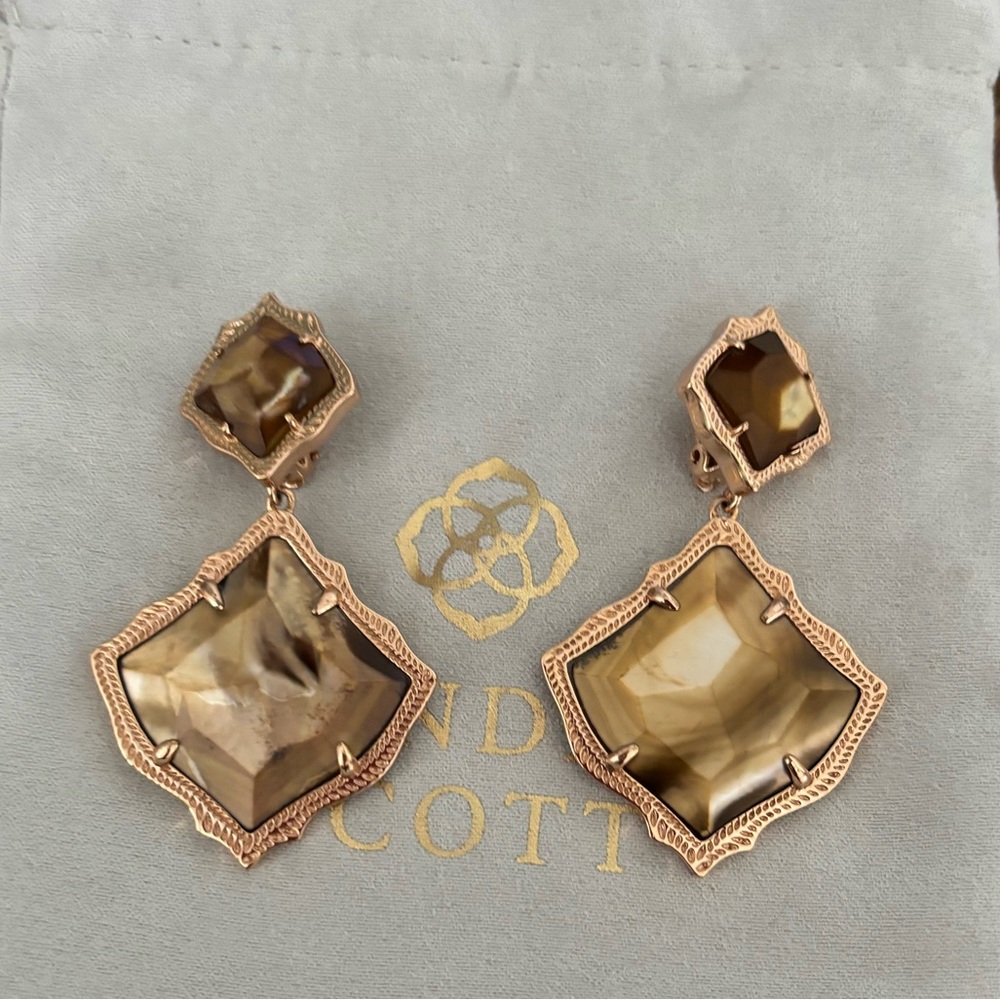 Brown mother of Pearl Kendra Scott clip on earrings